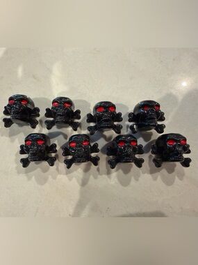 Skull and crossbones tire valve stem caps - Pack of 8